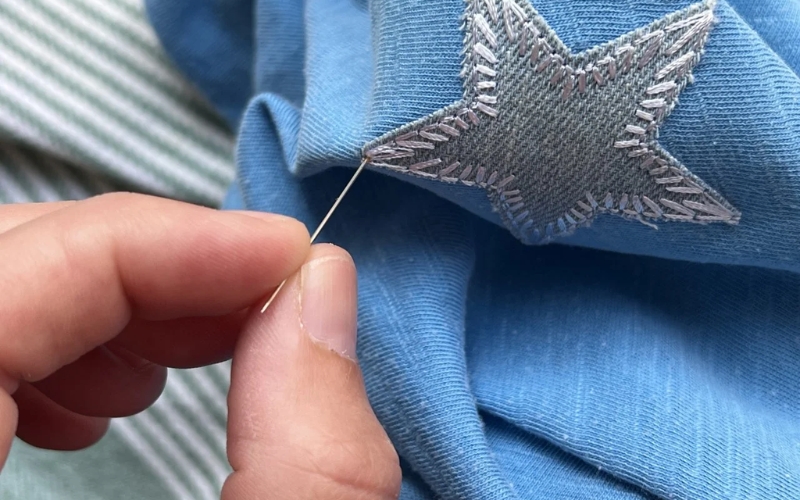 Consider the patch's design and how it interacts with the hat's existing features