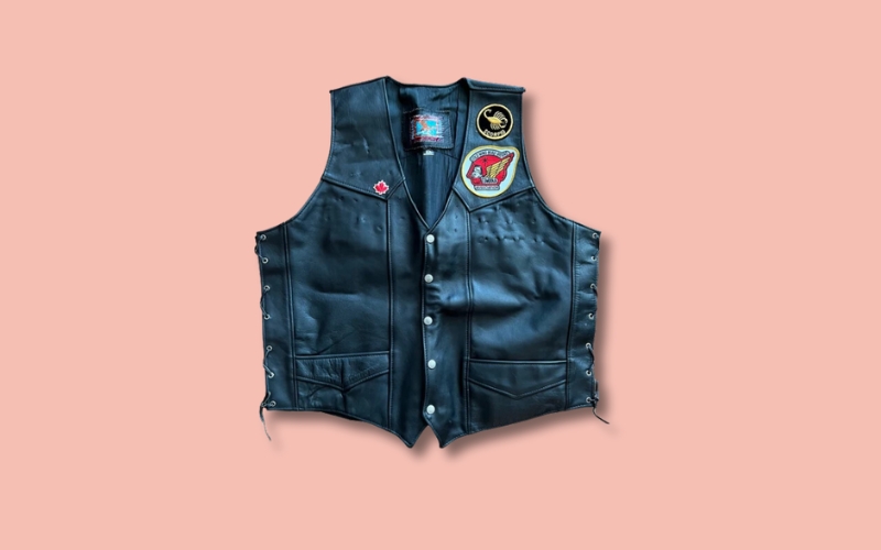 Side panels also accommodate patches representing affiliations that don't conflict with the wearer's primary club