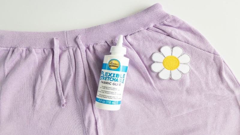 Fabric glue offers a simpler, faster alternative to sewing, suitable for lightweight patches and less-stressed areas