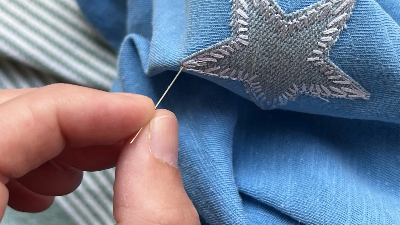 Turn the garment inside out and iron the back of the patch for about 30 seconds