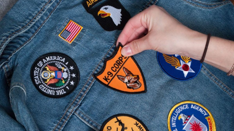 Clean the garment area where the patch will be applied, ensuring both the fabric and the patch are lint-free