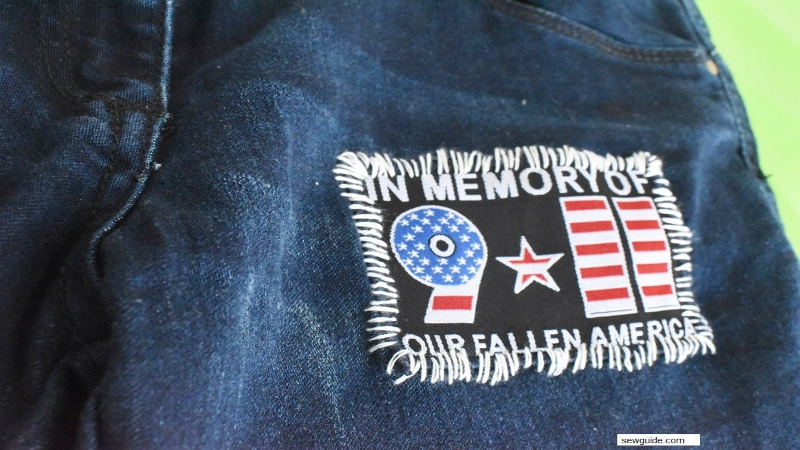 Lay your jeans flat on the ironing board, smoothing out any wrinkles or creases in the fabric