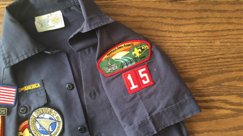 The left sleeve features crucial identifiers